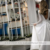 NICEB Deep V Neck Shiny Wedding Dresses With Pockets Satin Sweep Train Wedding Gown Glitter Long Sleeve 2023 Bridal Party